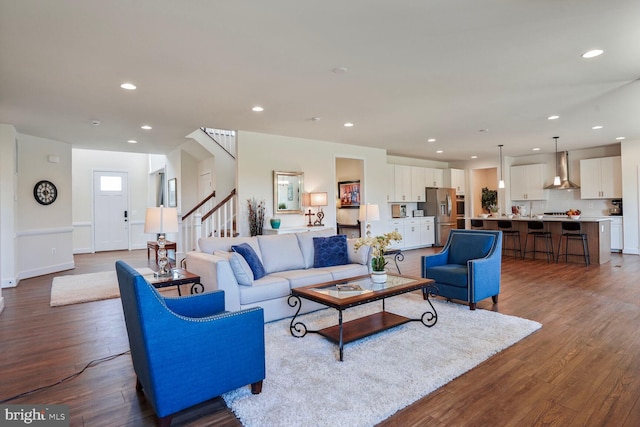 11100 Slate Landing Ln, Nokesville, VA 20181 - living area with recessed lighting, wood finished floors, and stairway