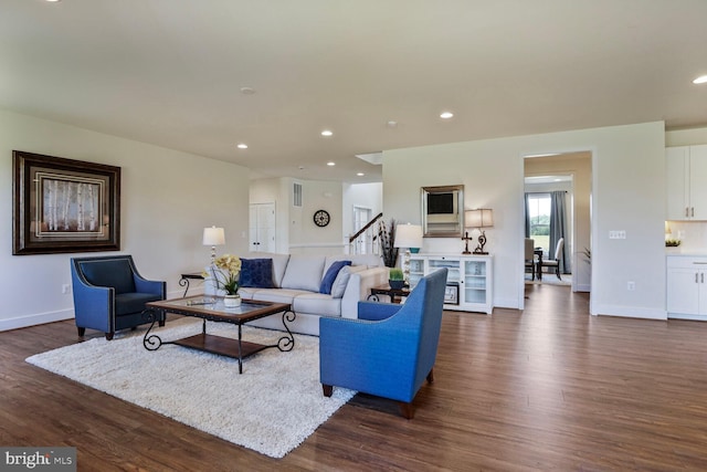 11100 Slate Landing Ln, Nokesville, VA 20181 - living area featuring dark wood finished floors, stairway, and recessed lighting