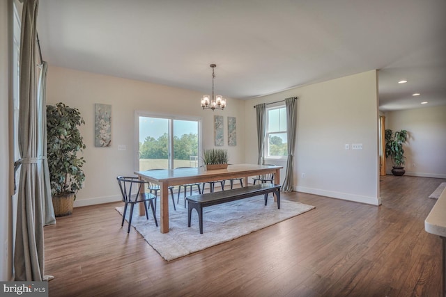 11100 Slate Landing Ln, Nokesville, VA 20181 - dining space with wood finished floors, a chandelier, and recessed lighting