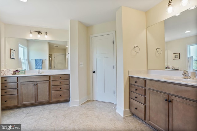11100 Slate Landing Ln, Nokesville, VA 20181 - bathroom with two vanities and tile patterned flooring
