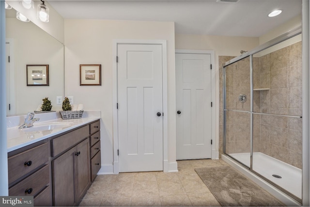 11100 Slate Landing Ln, Nokesville, VA 20181 - bathroom with vanity, a stall shower, and tile patterned floors