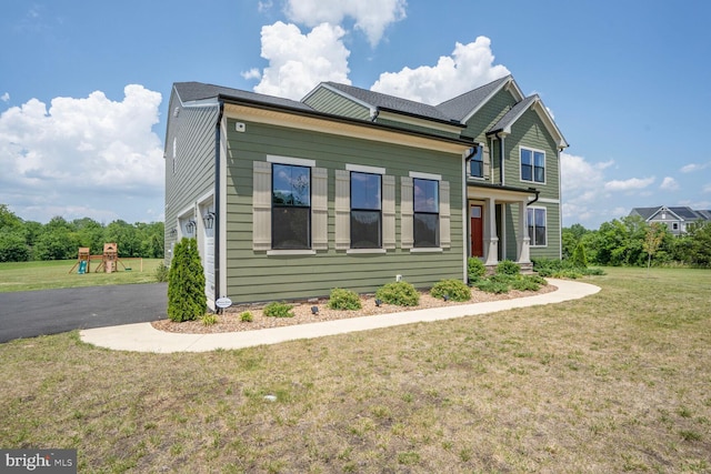 11100 Slate Landing Ln, Nokesville, VA 20181 - view of front of property featuring a playground, a front lawn, and asphalt driveway