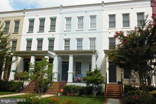 1340 S Carolina Ave SE, Washington, DC 20003 - view of property with a porch and stairs