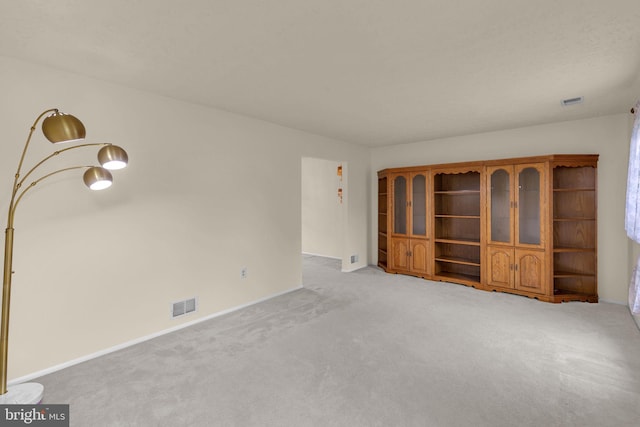 1848 Statesman Ct, Severn, MD 21144 - unfurnished living room with carpet and baseboards