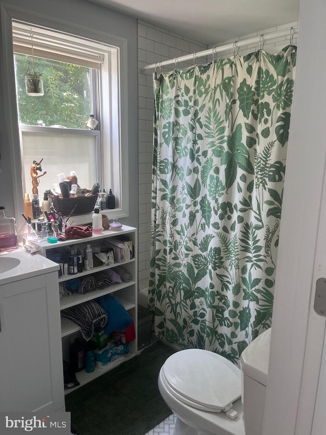 2813 Miles Ave, Baltimore, MD 21211 - bathroom featuring vanity and curtained shower
