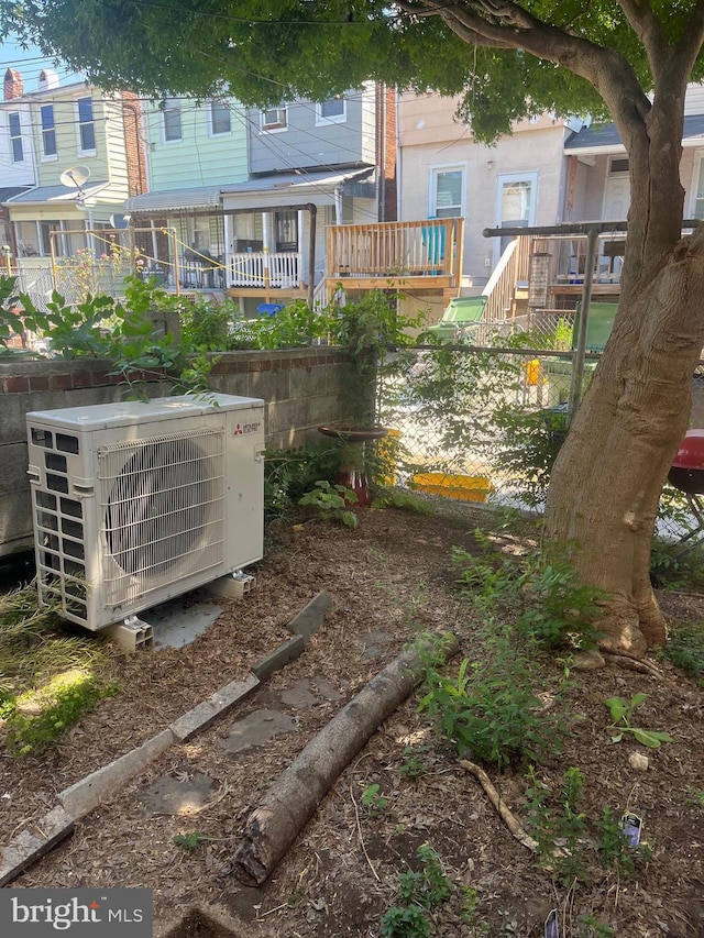 2813 Miles Ave, Baltimore, MD 21211 - exterior view of a cooling unit and a satellite dish