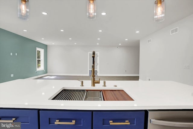 51FRANKLINDR Franklin Dr, Mechanicsburg, PA 17055 - kitchen with blue cabinetry, dishwasher, recessed lighting, and light countertops