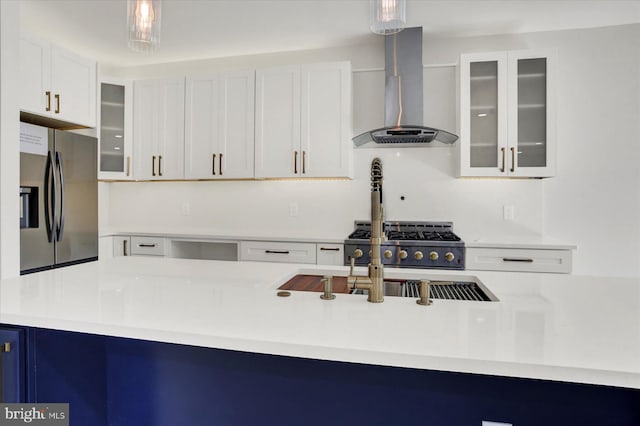 51FRANKLINDR Franklin Dr, Mechanicsburg, PA 17055 - kitchen with wall chimney range hood, appliances with stainless steel finishes, light countertops, and white cabinets