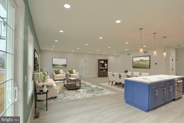 51FRANKLINDR Franklin Dr, Mechanicsburg, PA 17055 - kitchen featuring light wood finished floors, open floor plan, recessed lighting, a center island, and blue cabinetry