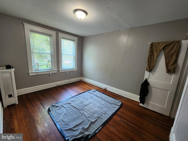 5228 Denmore Ave, Baltimore, MD 21215 - bedroom featuring wood finished floors and baseboards