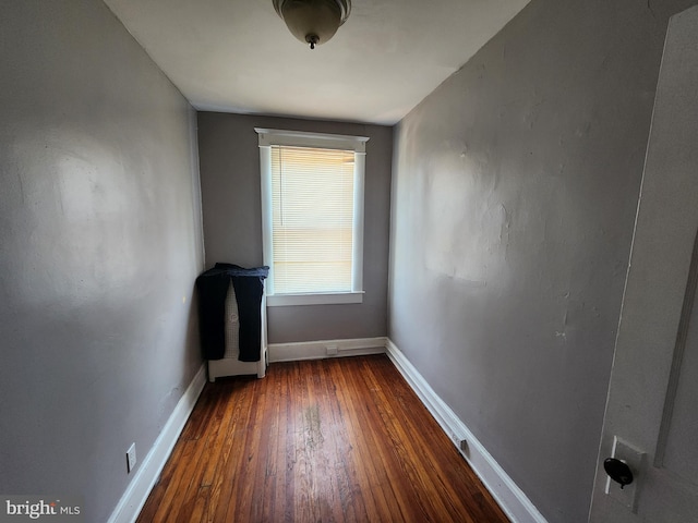 5228 Denmore Ave, Baltimore, MD 21215 - spare room featuring hardwood / wood-style floors and baseboards