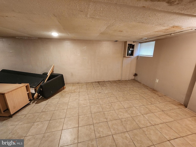 5228 Denmore Ave, Baltimore, MD 21215 - below grade area featuring light tile patterned floors
