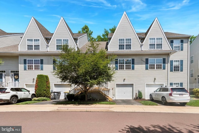 213 Buchanan Ct, Downingtown, PA 19335 - townhome / multi-family property with driveway and a garage