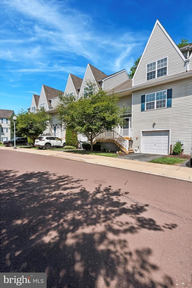 213 Buchanan Ct, Downingtown, PA 19335 - view of asphalt road with street lights and a residential view