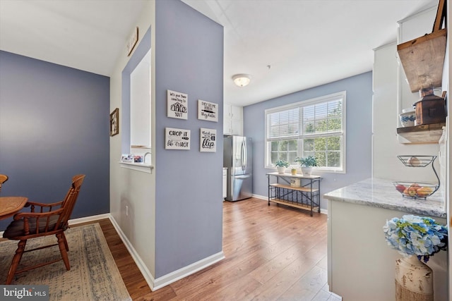 213 Buchanan Ct, Downingtown, PA 19335 - dining room featuring light wood finished floors and baseboards