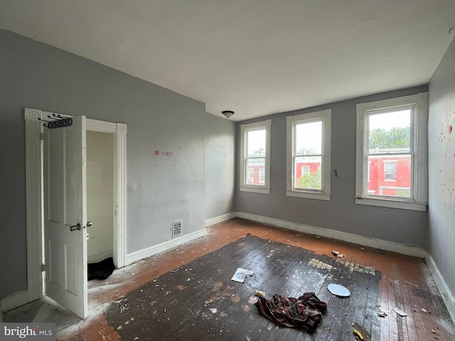 2532 W Baltimore St, Baltimore, MD 21223 - unfurnished room featuring hardwood / wood-style floors and baseboards
