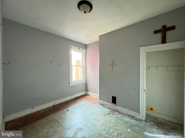 2532 W Baltimore St, Baltimore, MD 21223 - unfurnished bedroom with baseboards and a closet