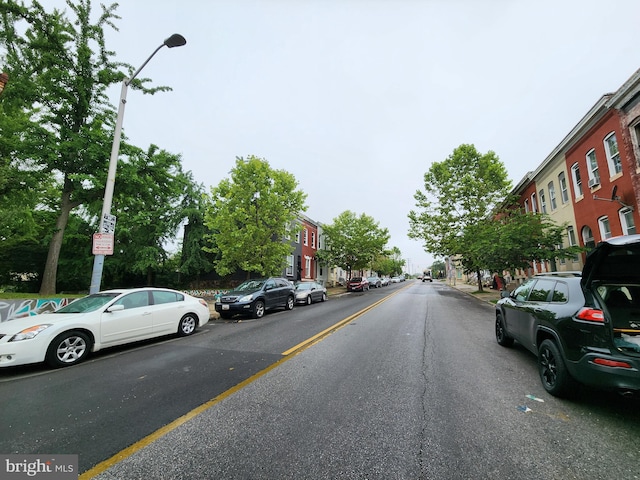 2532 W Baltimore St, Baltimore, MD 21223 - view of asphalt road featuring street lighting and curbs