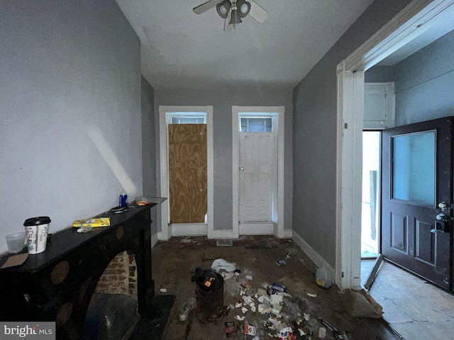 2532 W Baltimore St, Baltimore, MD 21223 - foyer featuring a ceiling fan and baseboards