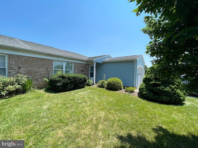 5650 Sandy Ct, Frederick, MD 21703 - view of property exterior with a yard and brick siding