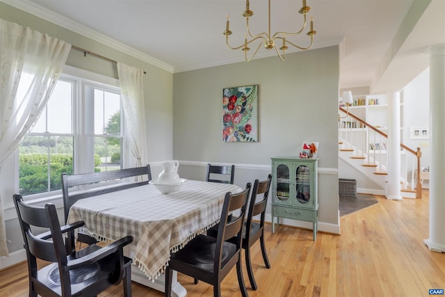 928 Slate Mill Rd Unit B, Stanardsville, VA 22973 - dining space with healthy amount of natural light, stairs, light wood finished floors, a chandelier, and crown molding