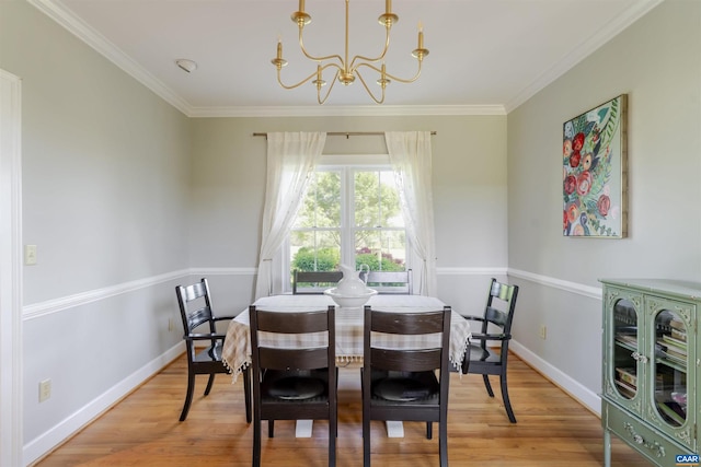 928 Slate Mill Rd Unit B, Stanardsville, VA 22973 - dining space with a chandelier, ornamental molding, and light wood-style flooring