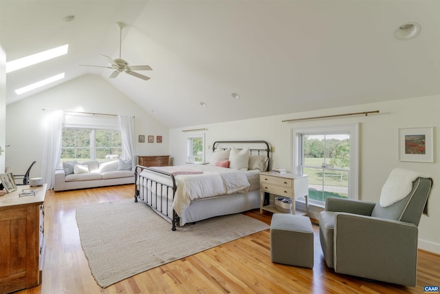 928 Slate Mill Rd Unit B, Stanardsville, VA 22973 - bedroom featuring a skylight, lofted ceiling, light wood-type flooring, and a ceiling fan