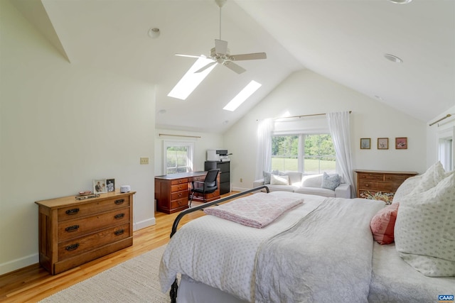 928 Slate Mill Rd Unit B, Stanardsville, VA 22973 - bedroom with multiple windows, light wood-type flooring, a skylight, an office area, and vaulted ceiling