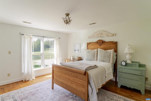 928 Slate Mill Rd Unit B, Stanardsville, VA 22973 - bedroom featuring wood finished floors and baseboards