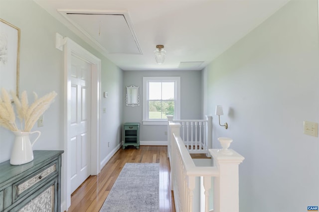 928 Slate Mill Rd Unit B, Stanardsville, VA 22973 - hallway with attic access, an upstairs landing, and light wood finished floors