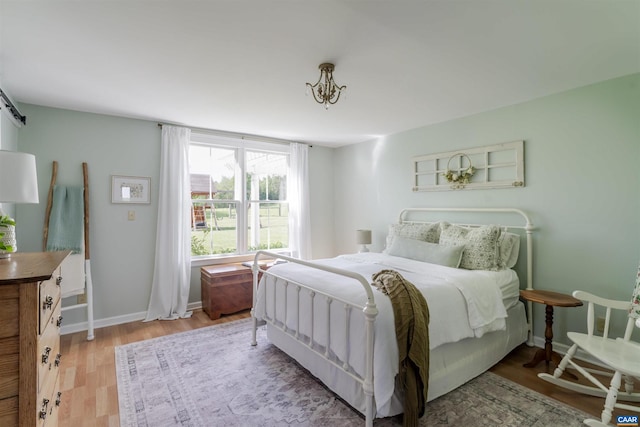 928 Slate Mill Rd Unit B, Stanardsville, VA 22973 - bedroom with wood finished floors and baseboards