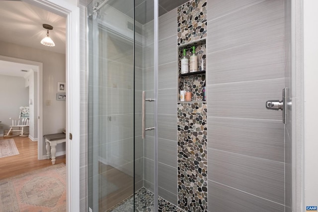 928 Slate Mill Rd Unit B, Stanardsville, VA 22973 - bathroom with a shower stall and wood finished floors