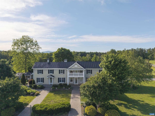 928 Slate Mill Rd Unit B, Stanardsville, VA 22973 - view of front of house with a balcony, a front lawn, and a chimney