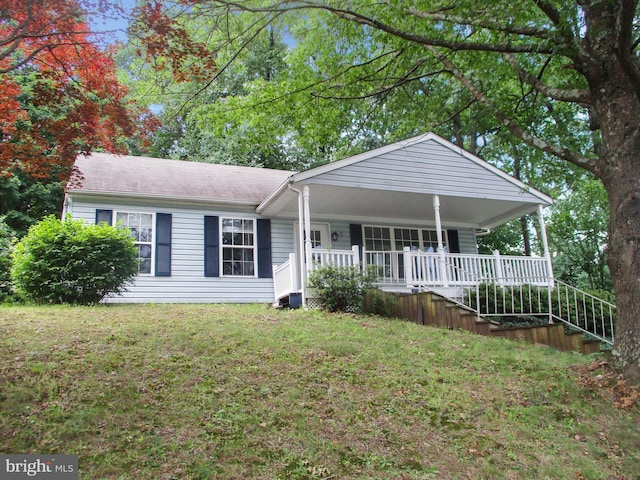 2 Queen Anne Dr, Boyertown, PA 19512 - view of front of house with covered porch and a front yard
