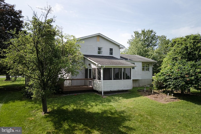 4834 Maple St, Bangor, PA 18013 - rear view of property featuring a sunroom, a yard, a wooden deck, and roof with shingles