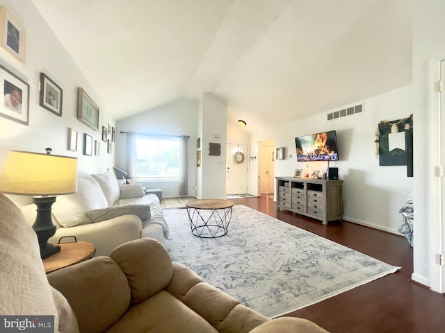 8 Aidone Ln, Smyrna, DE 19977 - living area featuring lofted ceiling and dark wood finished floors