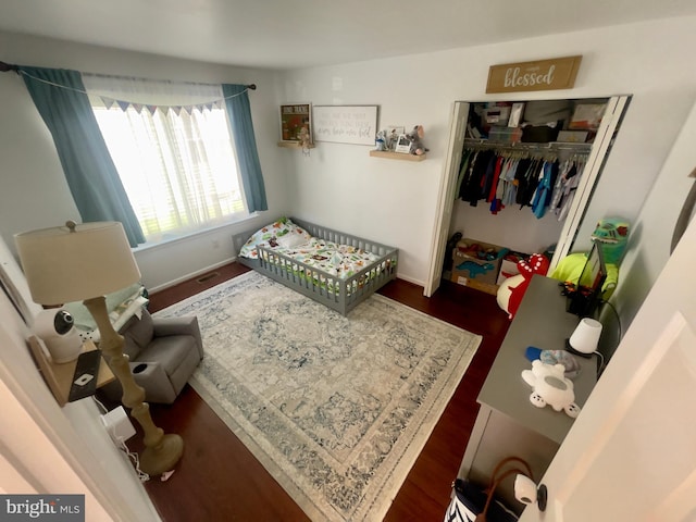 8 Aidone Ln, Smyrna, DE 19977 - bedroom with dark wood-style floors and a closet