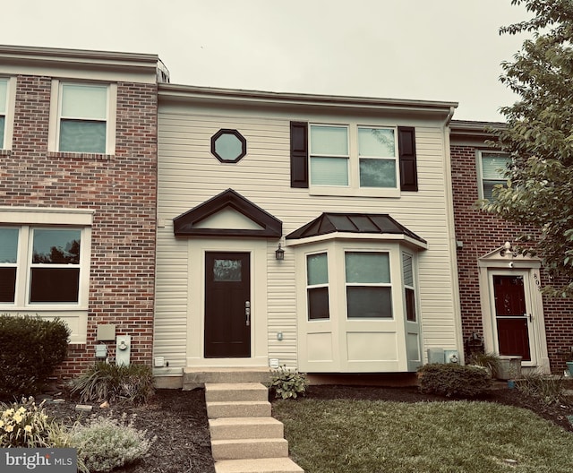 805 Comer Sq, Bel Air, MD 21014 - multi unit property with brick siding, a standing seam roof, and a metal roof