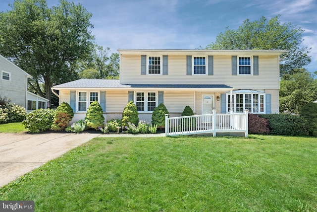 2621 Dartmouth Woods Rd, Wilmington, DE 19810 - view of front of home with brick siding and a front lawn