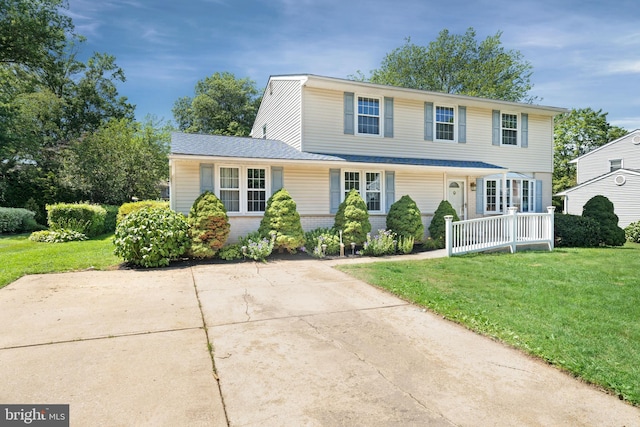 2621 Dartmouth Woods Rd, Wilmington, DE 19810 - view of front facade featuring a front lawn and brick siding
