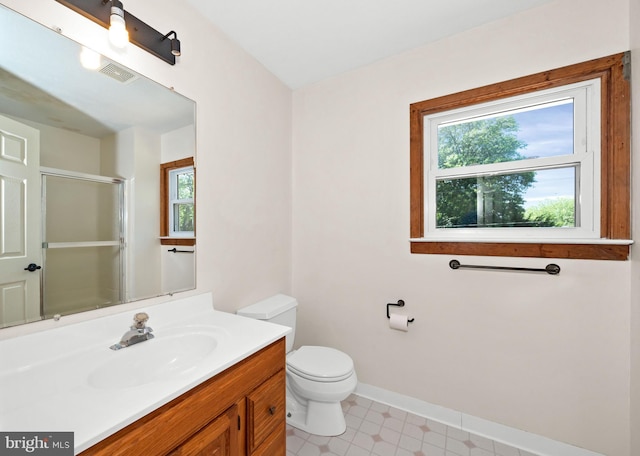 2621 Dartmouth Woods Rd, Wilmington, DE 19810 - bathroom with healthy amount of natural light, a shower with shower door, and vanity