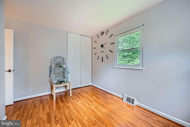 231 Candytuft Rd, Reisterstown, MD 21136 - unfurnished bedroom featuring light wood-style flooring and a closet
