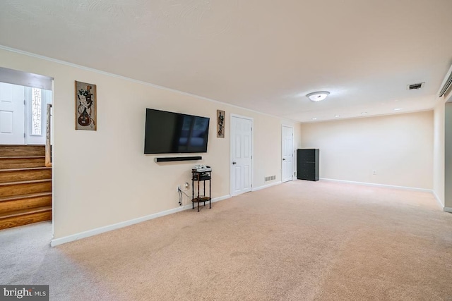 231 Candytuft Rd, Reisterstown, MD 21136 - unfurnished living room with carpet floors, crown molding, and stairs