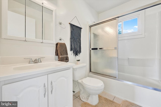 127 W Chestnut Hill Ln, Reisterstown, MD 21136 - full bathroom featuring vanity, tile patterned flooring, and enclosed tub / shower combo