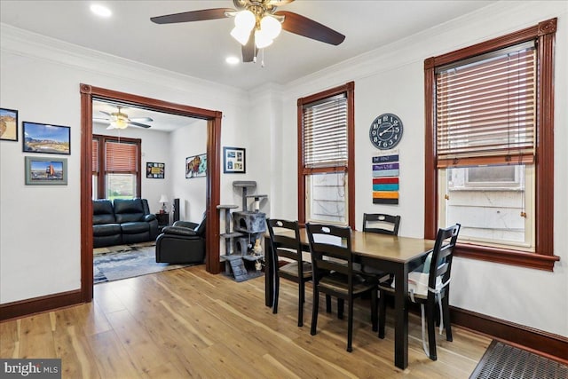 432 Mcdowell Ave, Hagerstown, MD 21740 - dining room featuring a ceiling fan, light wood-style floors, and crown molding