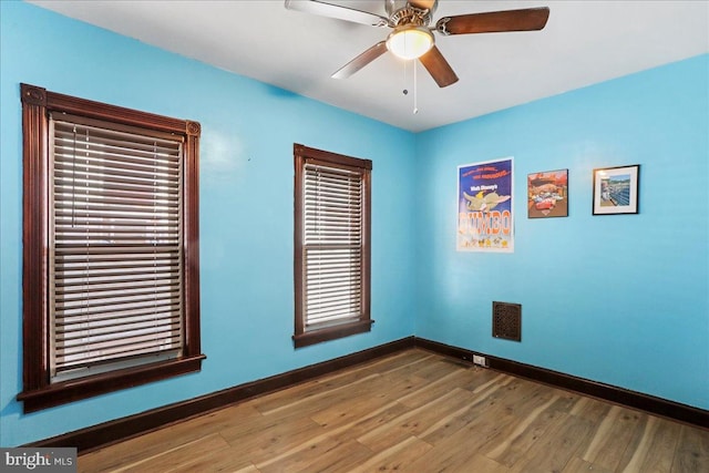 432 Mcdowell Ave, Hagerstown, MD 21740 - empty room with wood finished floors and a ceiling fan