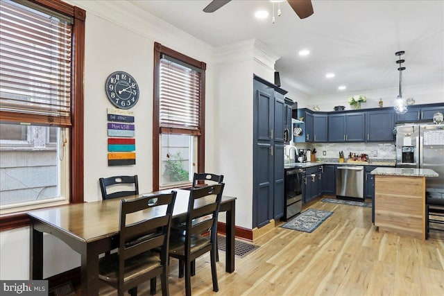 432 Mcdowell Ave, Hagerstown, MD 21740 - kitchen featuring stainless steel appliances, a ceiling fan, tasteful backsplash, light stone countertops, and light wood finished floors
