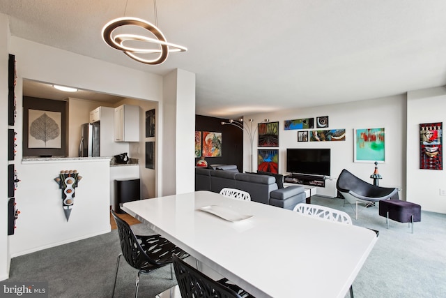 2059 Huntington Ave Unit 1406, Alexandria, VA 22303 - dining area with dark carpet and a chandelier
