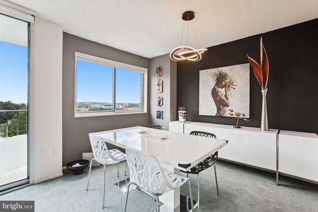 2059 Huntington Ave Unit 1406, Alexandria, VA 22303 - carpeted dining space with a chandelier