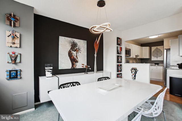 2059 Huntington Ave Unit 1406, Alexandria, VA 22303 - dining area featuring a chandelier